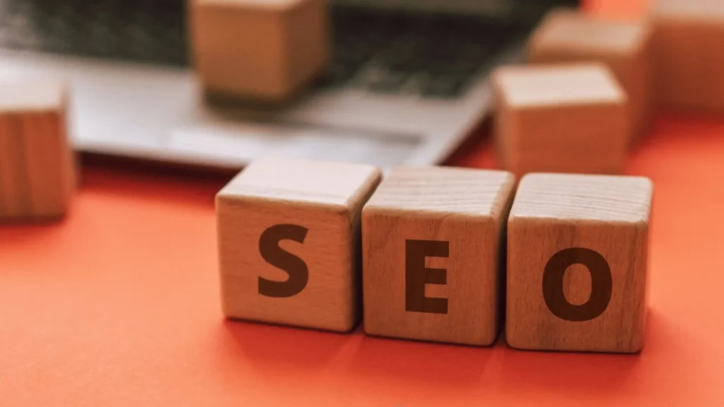 a wooden cubes with SEO letters on them